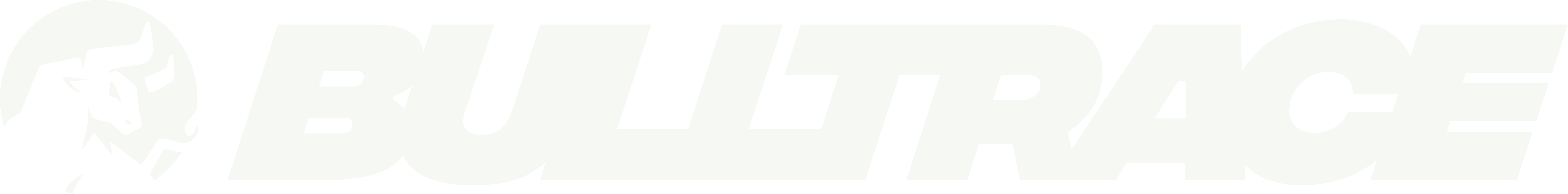 TRAQCKER logo